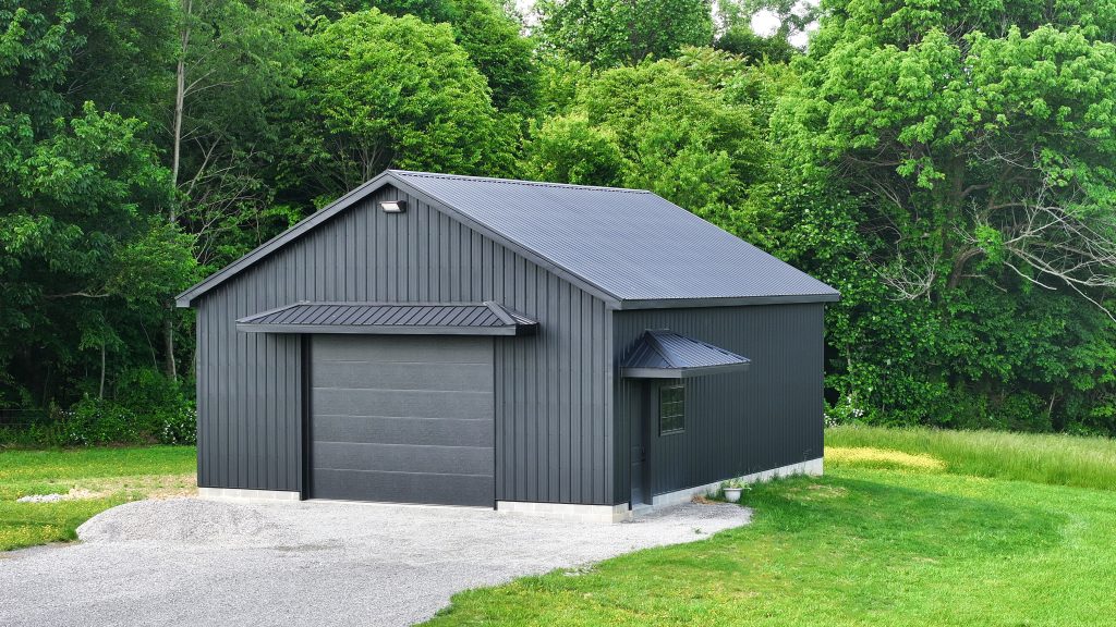 Black roof and siding on a quaint garage